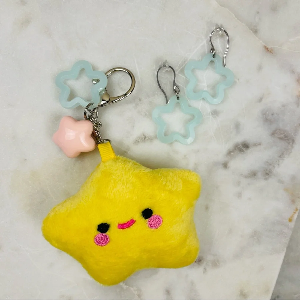 Rave festival earrings & bags, binkies, plush bag charms.